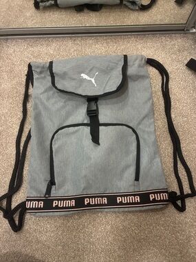 Puma Gray Drawstring Backpack with Black Trim and Pink Accent